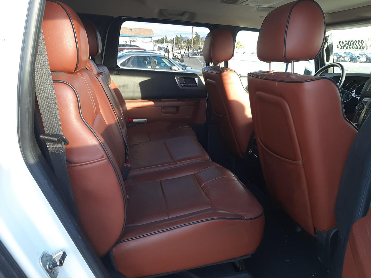 Photo 6 from auction – 2008 HUMMER H2 with VIN 5GRGN238X8H105718