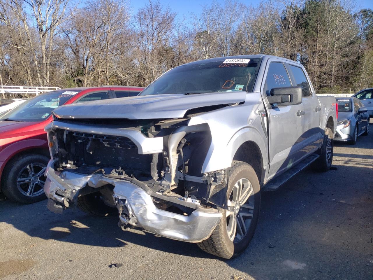 Photo 2 from auction – 2021 FORD F150 SUPER with VIN 1FTFW1E59MKD20026