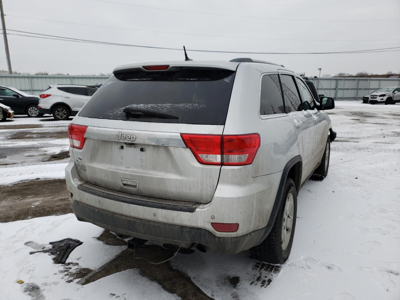 Photo 4 from auction – 2012 JEEP GRAND CHER with VIN 1C4RJFAG2CC256579