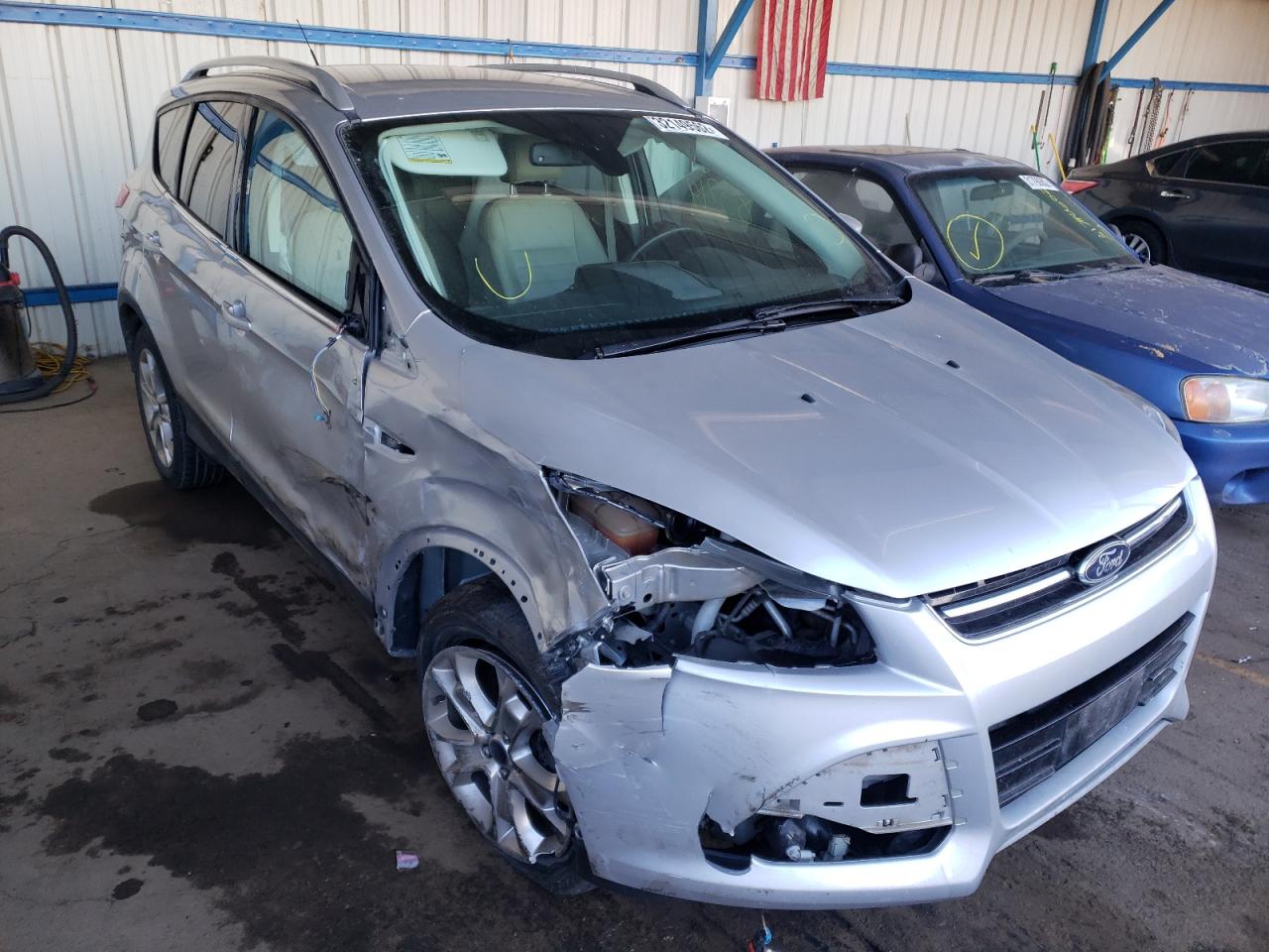 FORD ESCAPE TIT 2014 with VIN 1FMCU9JX6EUC21972 - Photo from auction