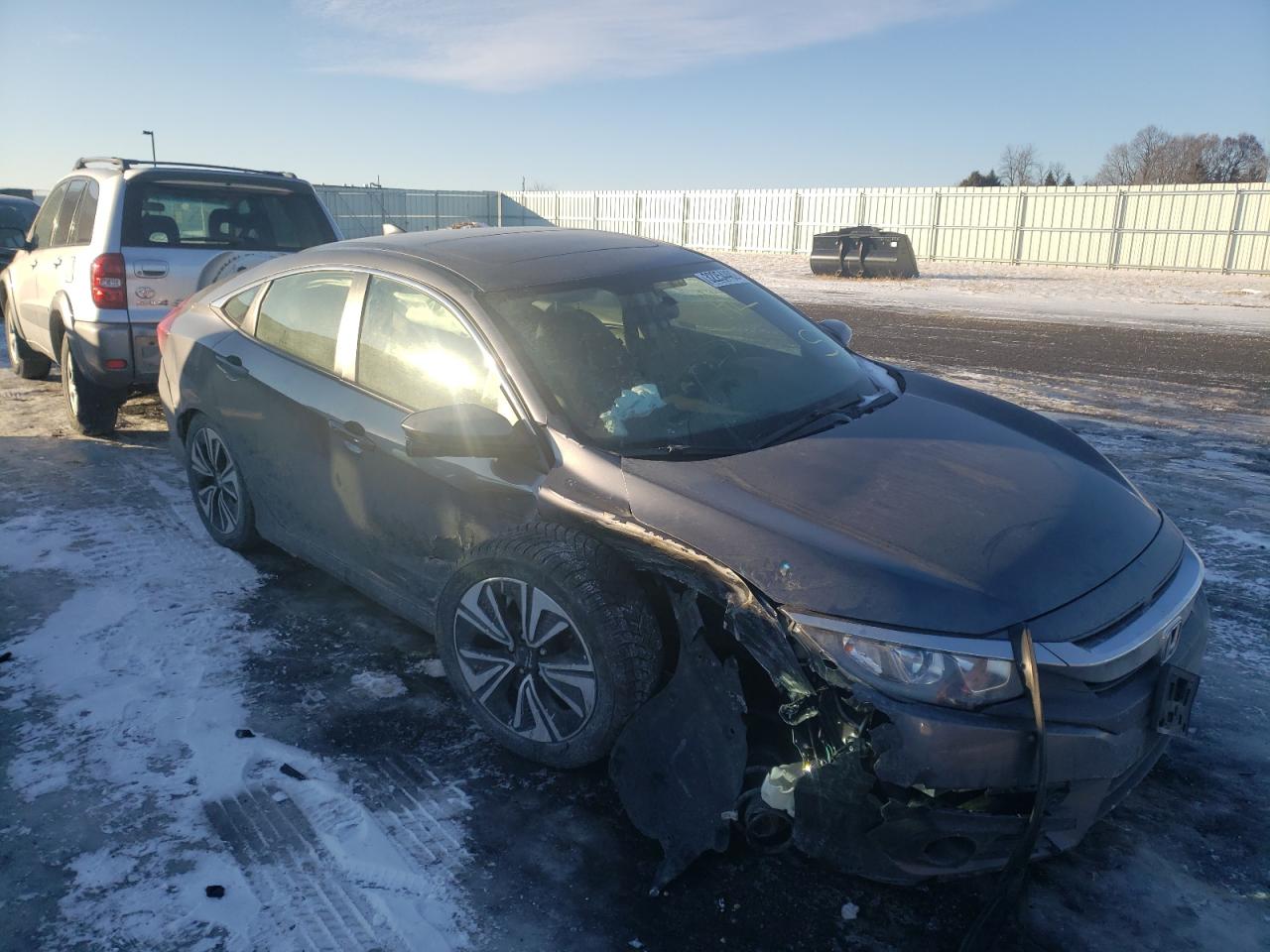 Photo 1 from auction – 2018 HONDA CIVIC EX with VIN JHMFC1F39JX013555