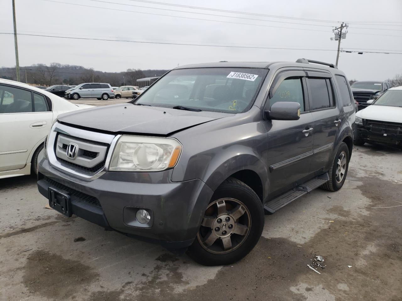 Photo 2 from auction – 2011 HONDA PILOT TOUR with VIN 5FNYF4H91BB086063