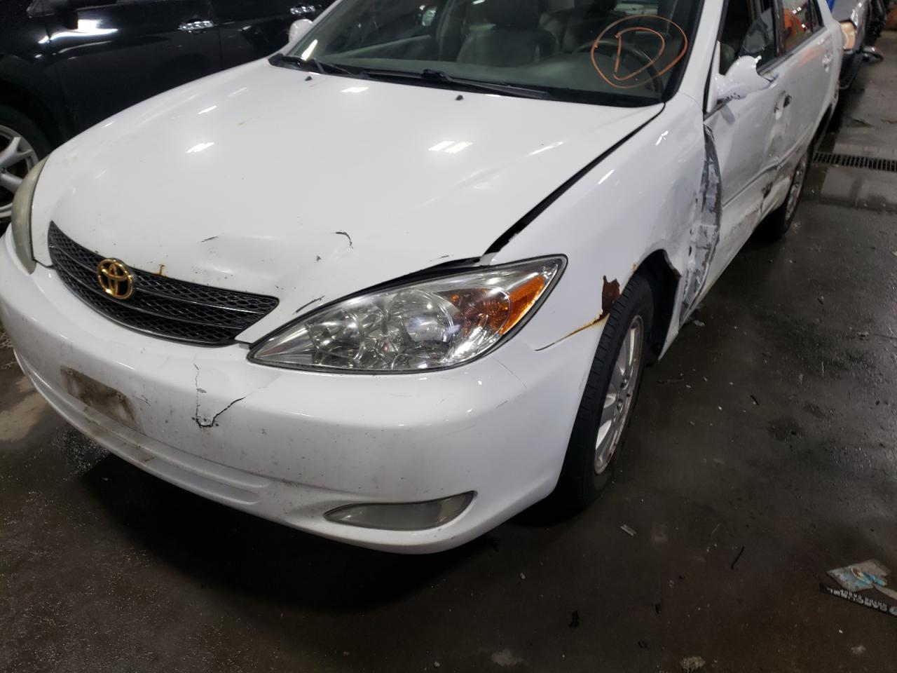 Photo 10 from auction – 2003 TOYOTA CAMRY LE with VIN 4T1BE30K73U227708