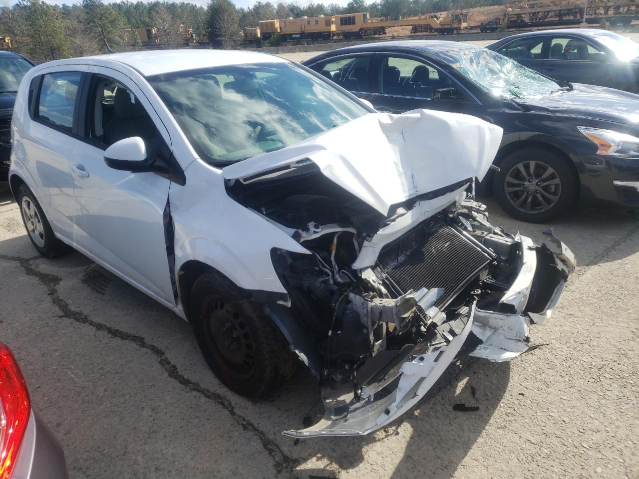 CHEVROLET SONIC LS 2014 with VIN 1G1JA6SHXE4133638 - Photo from auction