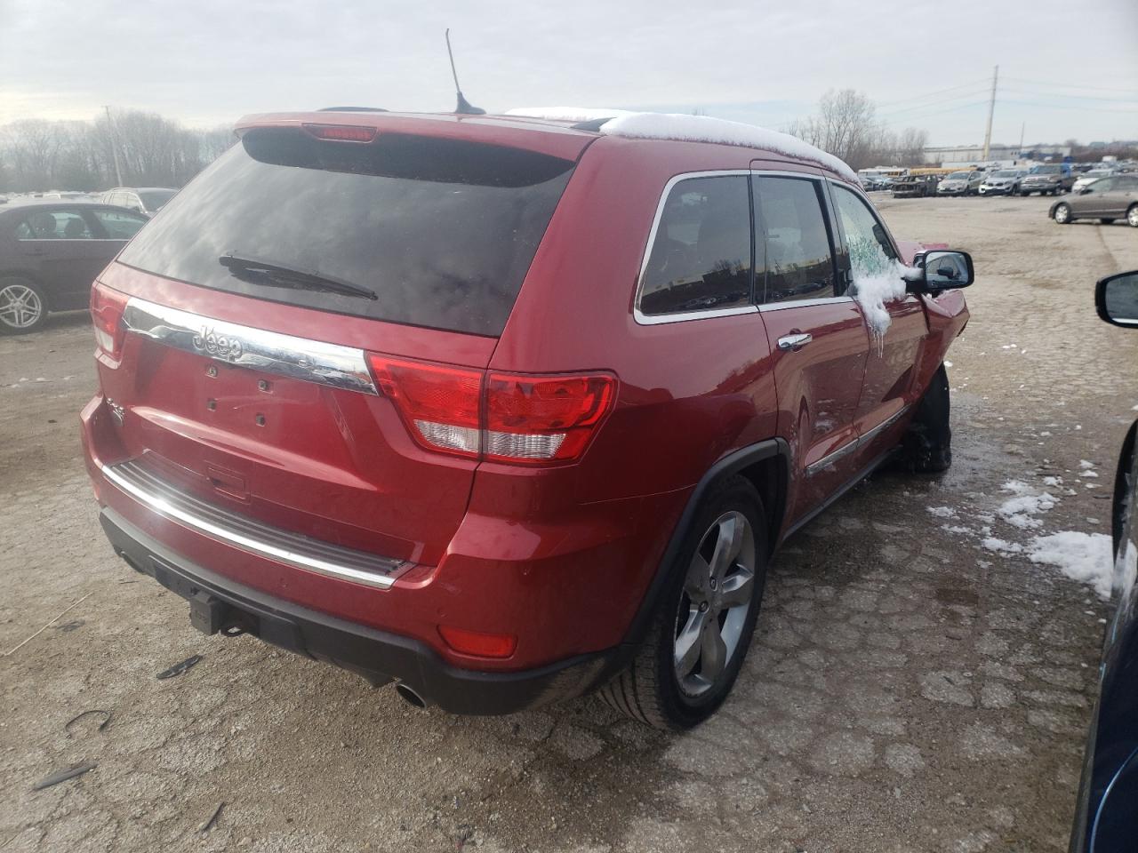 Photo 4 from auction – 2011 JEEP GRAND CHER with VIN 1J4RR6GT9BC685157