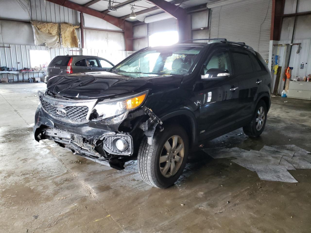 Photo 2 from auction – 2013 KIA SORENTO LX with VIN 5XYKTCA67DG329248