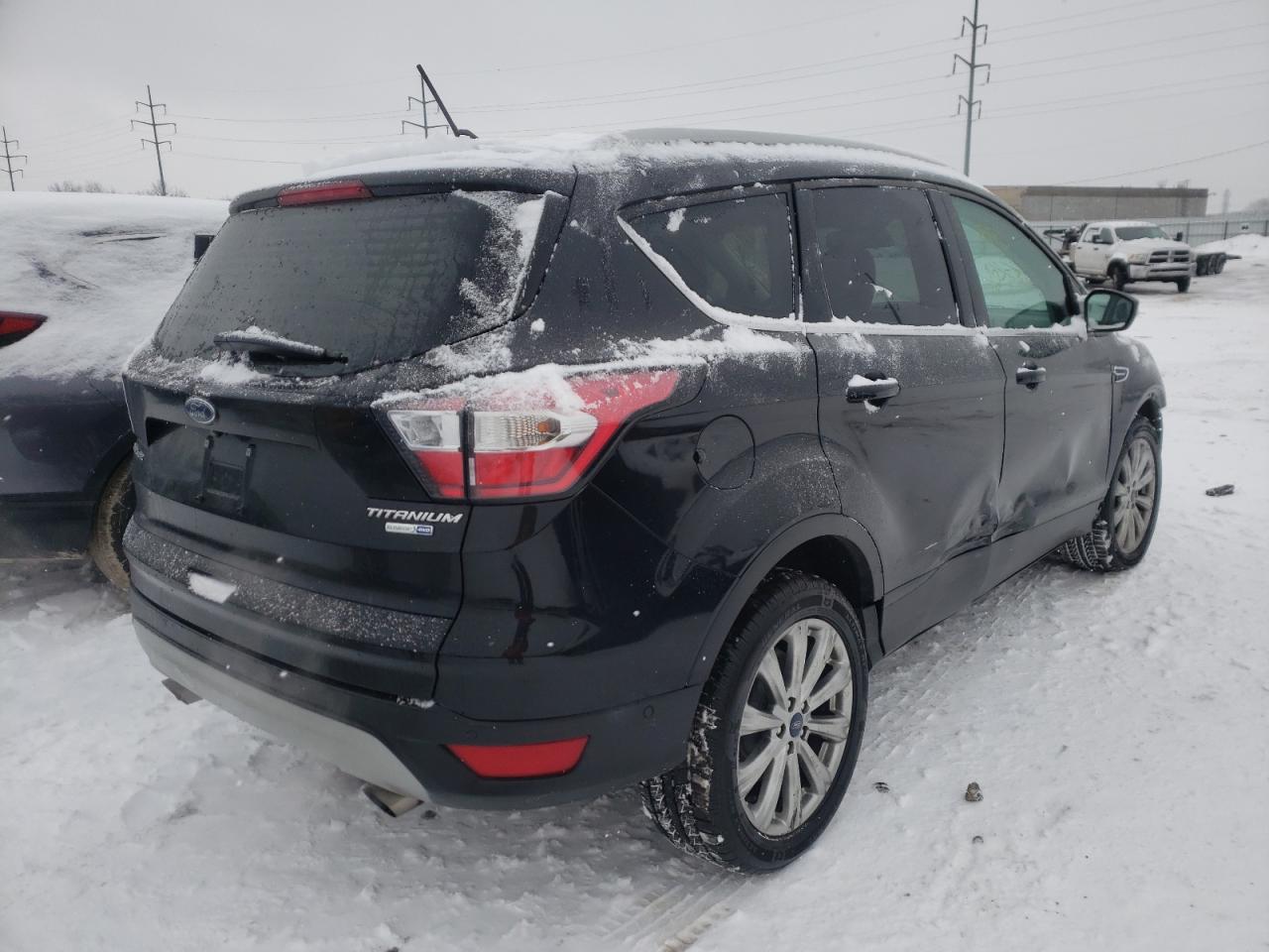 Photo 4 from auction – 2018 FORD ESCAPE TIT with VIN 1FMCU9J94JUA01337