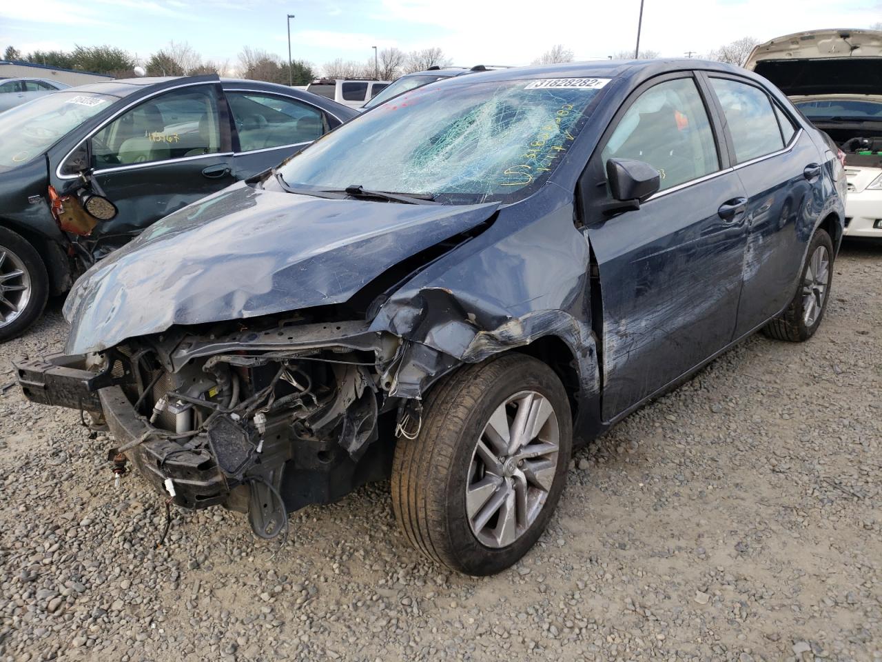 Photo 2 from auction – 2014 TOYOTA COROLLA EC with VIN 5YFBPRHE5EP035820