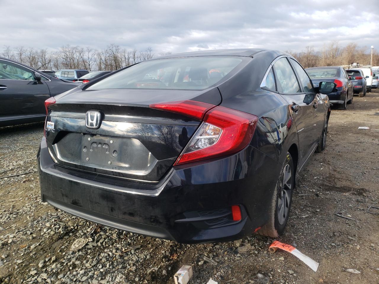 Photo 4 from auction – 2016 HONDA CIVIC EX with VIN 2HGFC2F71GH568489