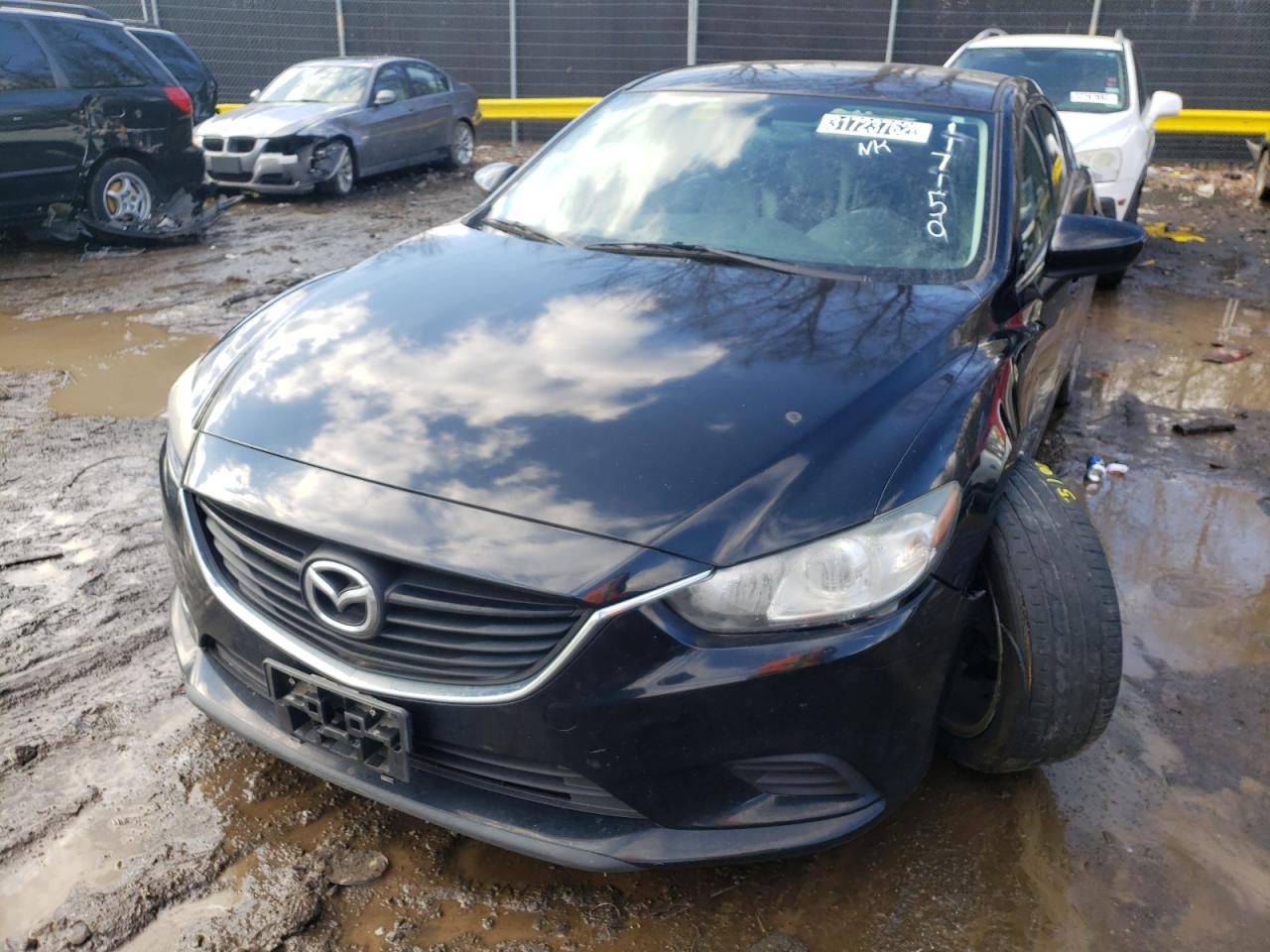 Photo 9 from auction – 2014 MAZDA 6 TOURING with VIN JM1GJ1V6XE1117150