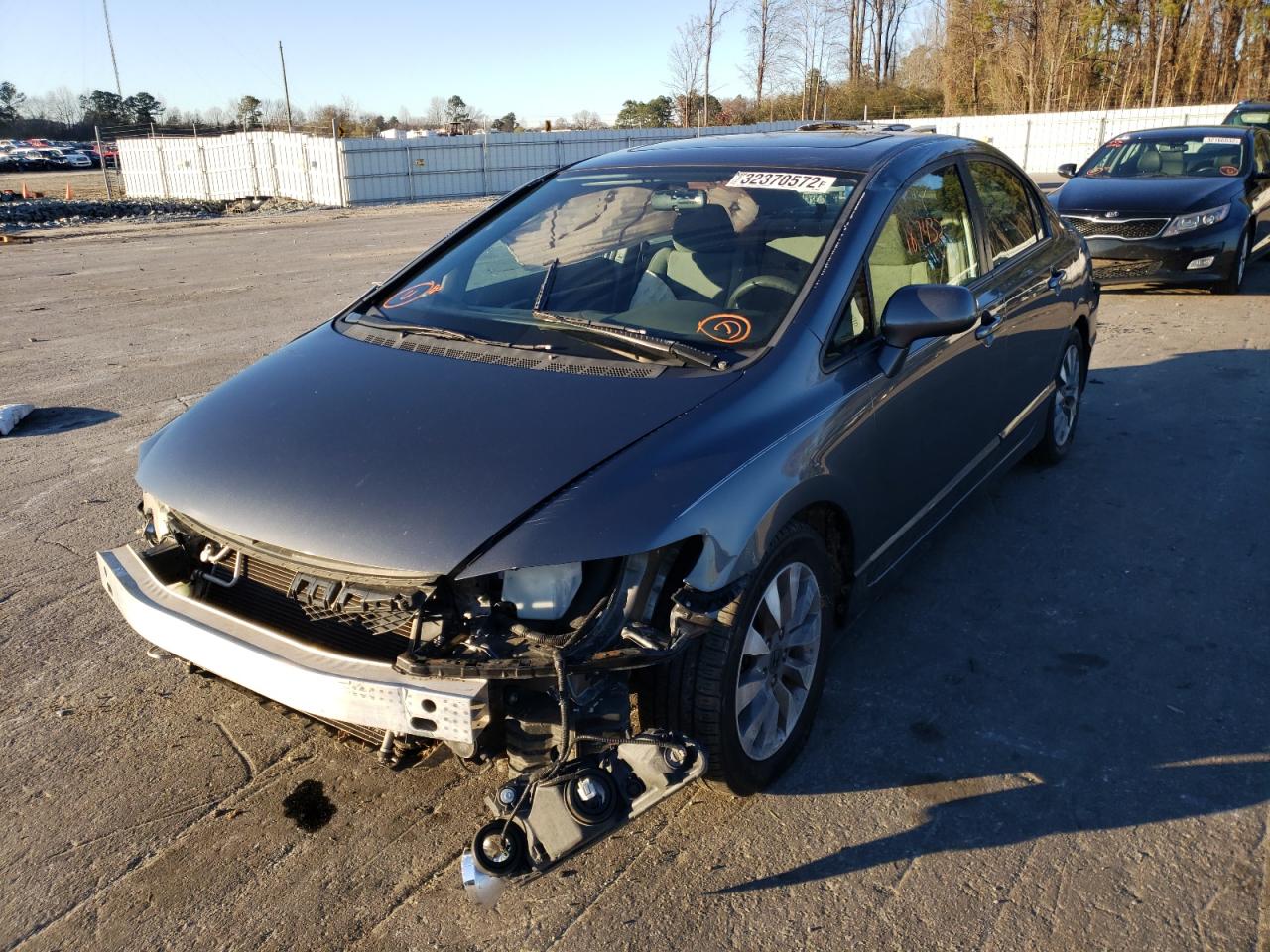 Фото 2 с аукциона – 2011 HONDA CIVIC EX с VIN 19XFA1F84BE013984