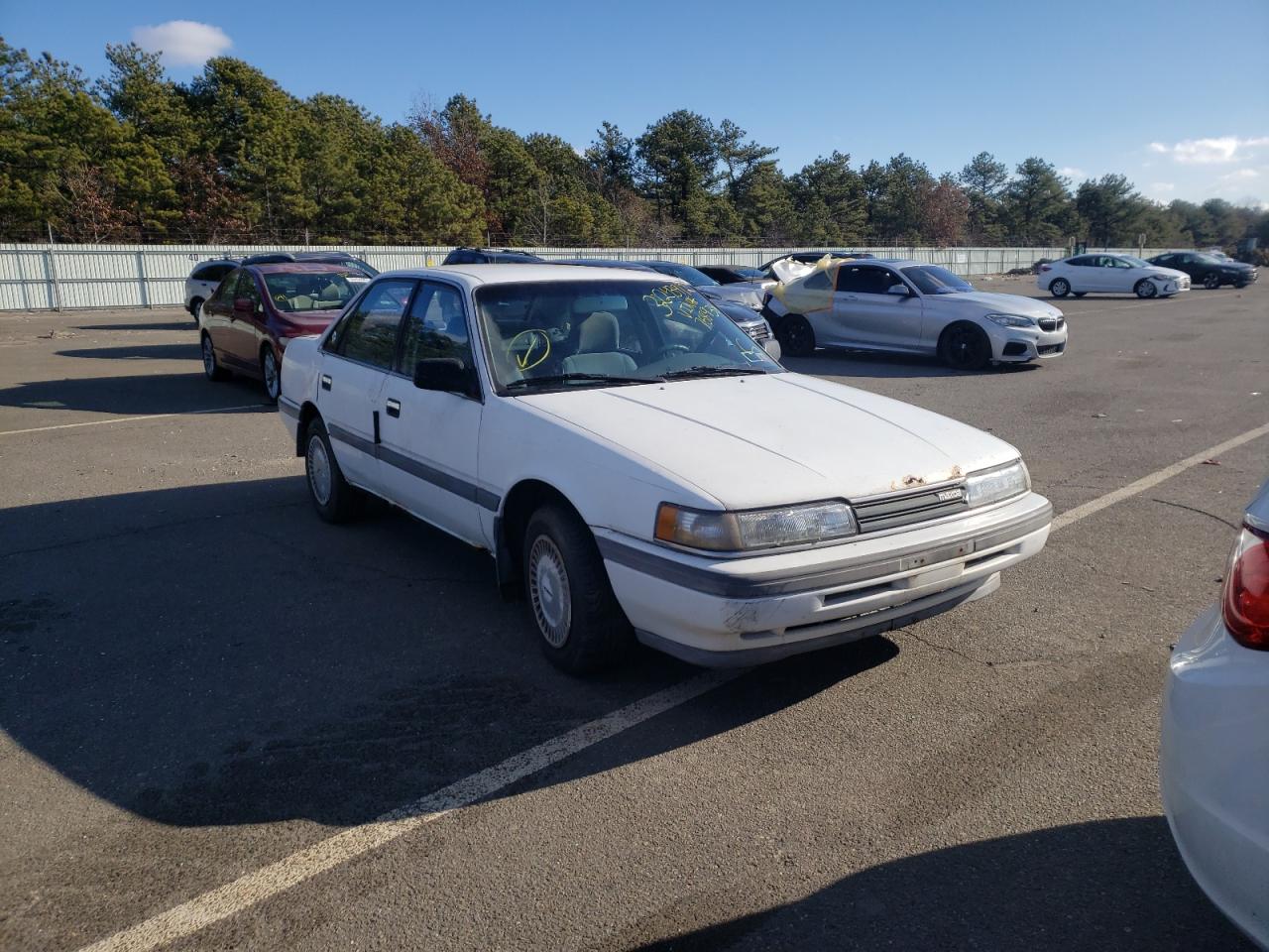 MAZDA 626 1989 with VIN JM1GD2225K1768938 - Photo from auction