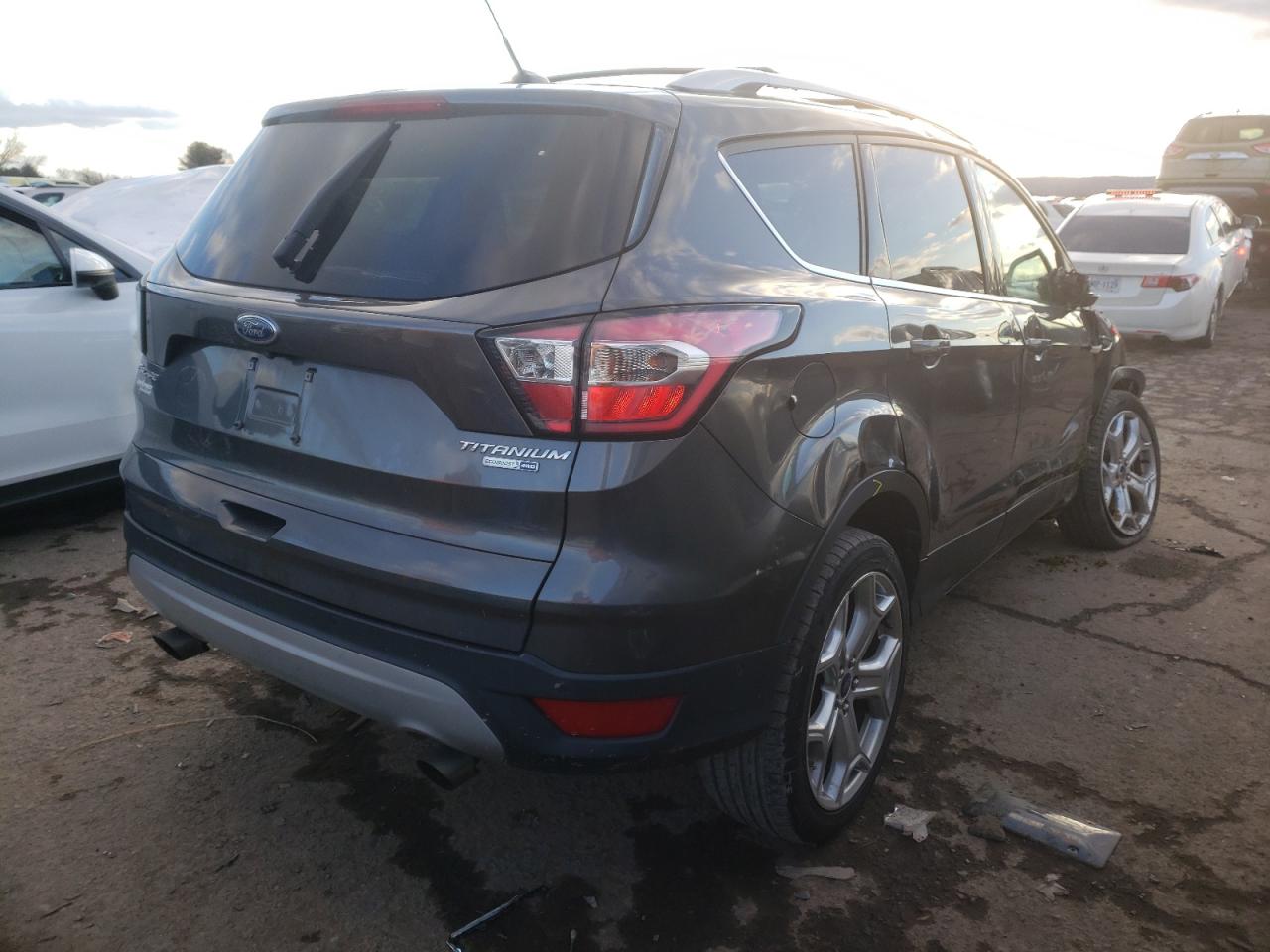 Photo 4 from auction – 2017 FORD ESCAPE TIT with VIN 1FMCU9J93HUB85356