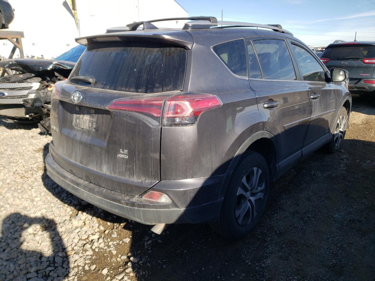 Photo 4 from auction – 2016 TOYOTA RAV4 LE with VIN JTMBFREV6GJ076908