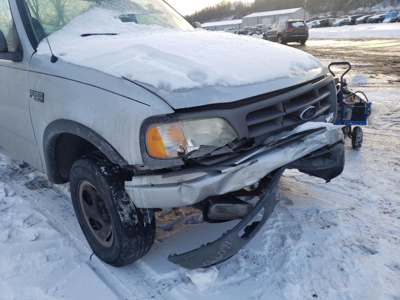 Photo 9 from auction – 2003 FORD F150 with VIN 2FTRF18203CA46054