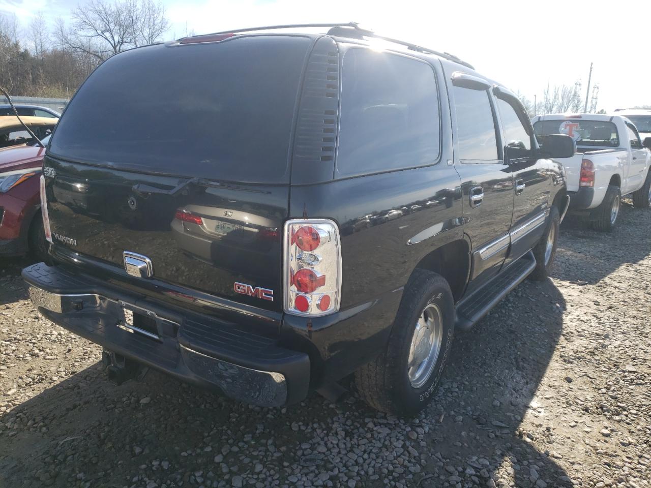 Photo 4 from auction – 2003 GMC YUKON with VIN 1GKEC13Z63J287800