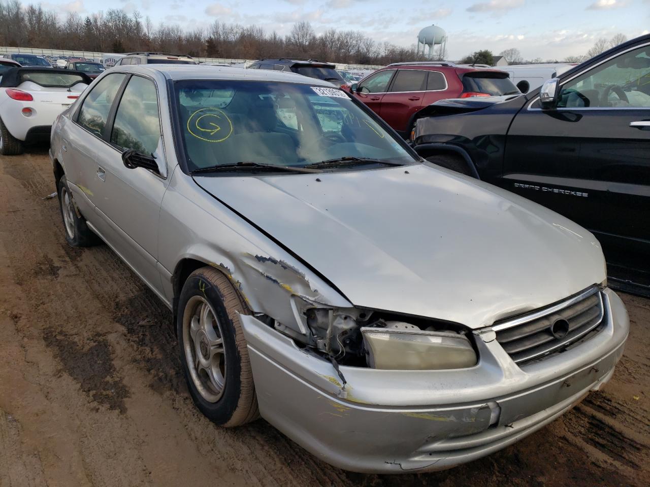 TOYOTA CAMRY CE 2000 with VIN 4T1BG22K4YU660833 - Photo from auction