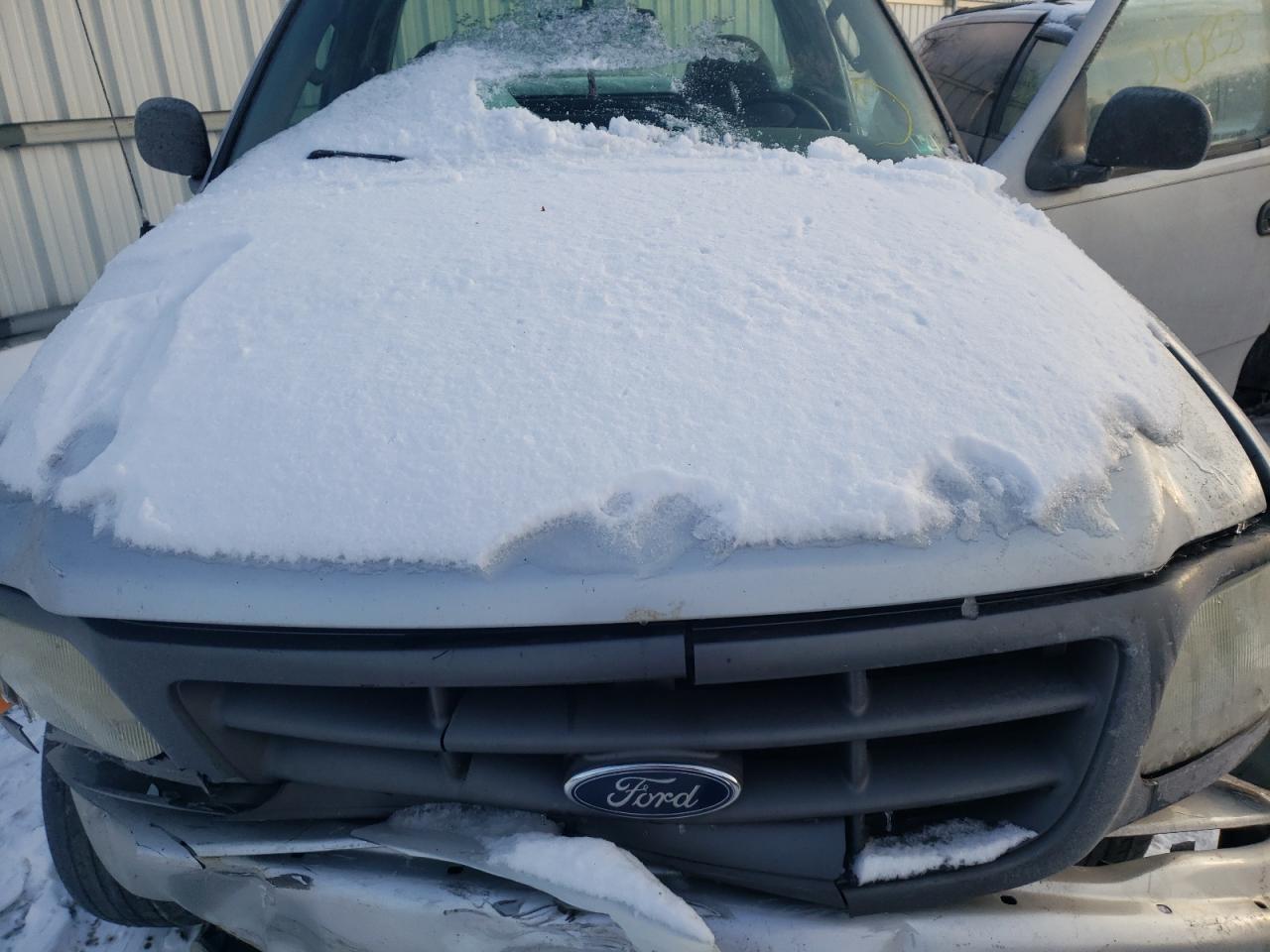 Photo 7 from auction – 2003 FORD F150 with VIN 2FTRF18203CA46054