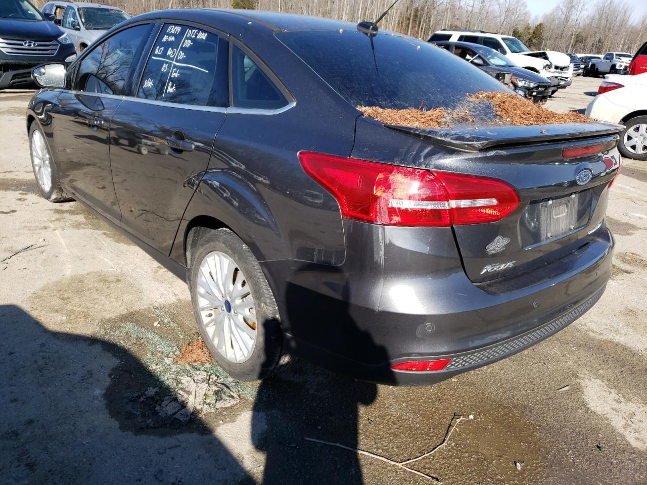 Photo 3 from auction – 2018 FORD FOCUS TITA with VIN 1FADP3J2XJL280613