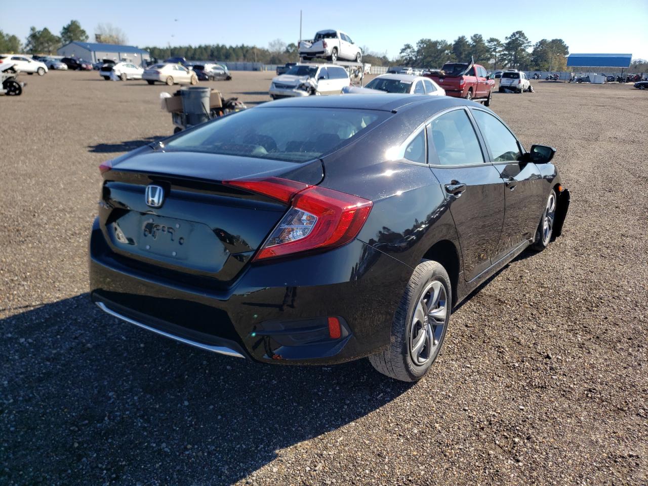 Photo 4 from auction – 2021 HONDA CIVIC LX with VIN 2HGFC2F66MH547656