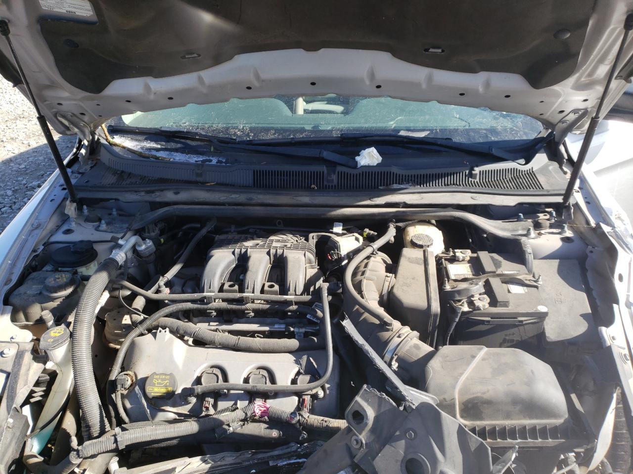 Photo 7 from auction – 2012 FORD TAURUS SE with VIN 1FAHP2DW3CG118473
