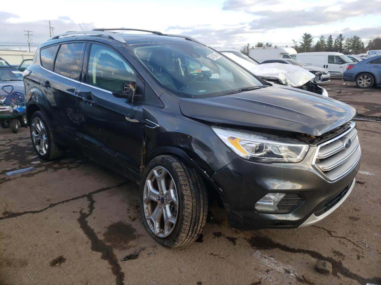 FORD ESCAPE TIT 2017 with VIN 1FMCU9J93HUB85356 - Photo from auction