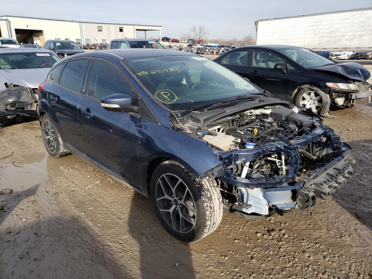 FORD FOCUS SEL 2018 with VIN 1FADP3M22JL216934 - Photo from auction