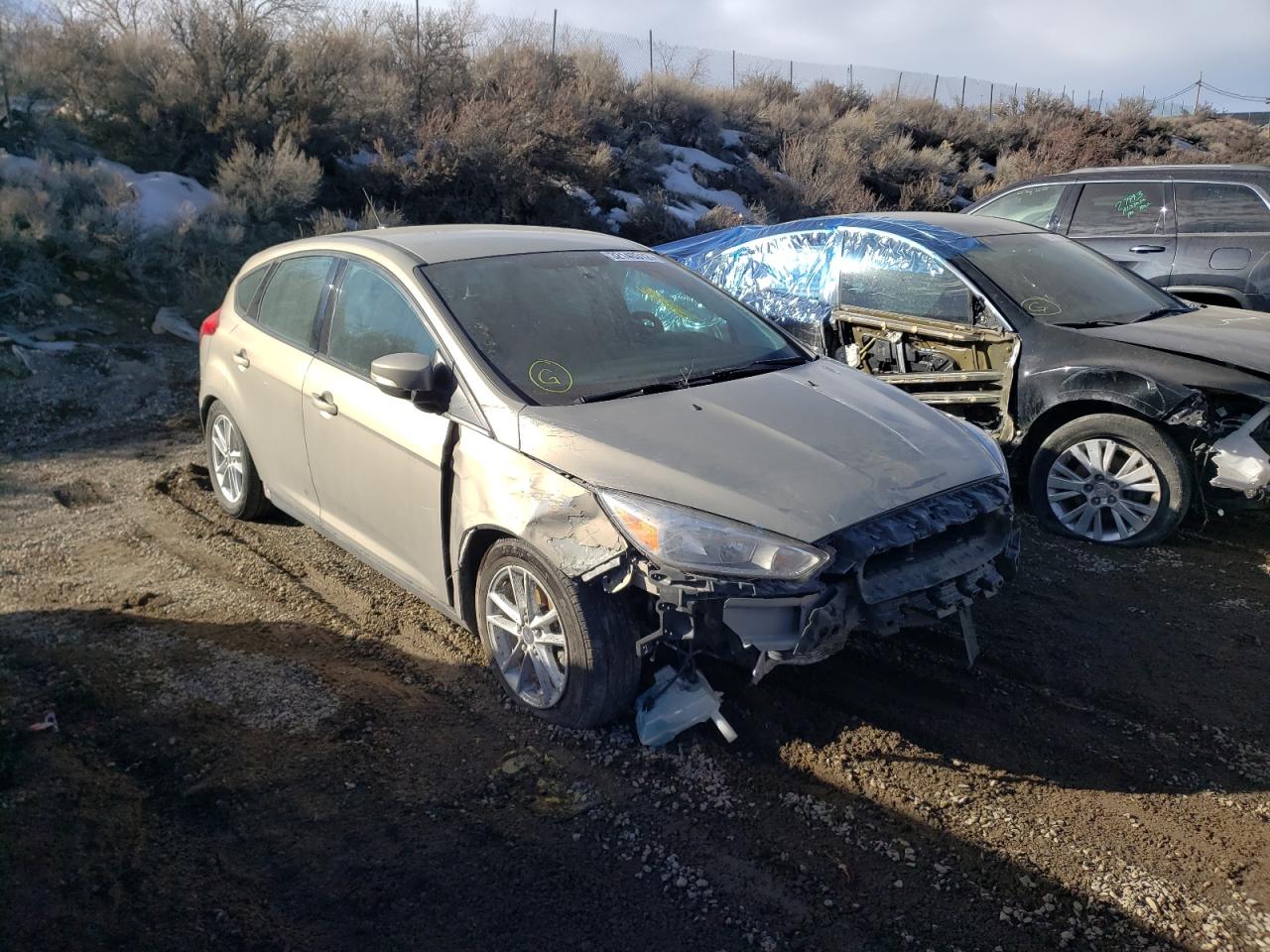 FORD FOCUS SE 2015 with VIN 1FADP3K2XFL369748 - Photo from auction
