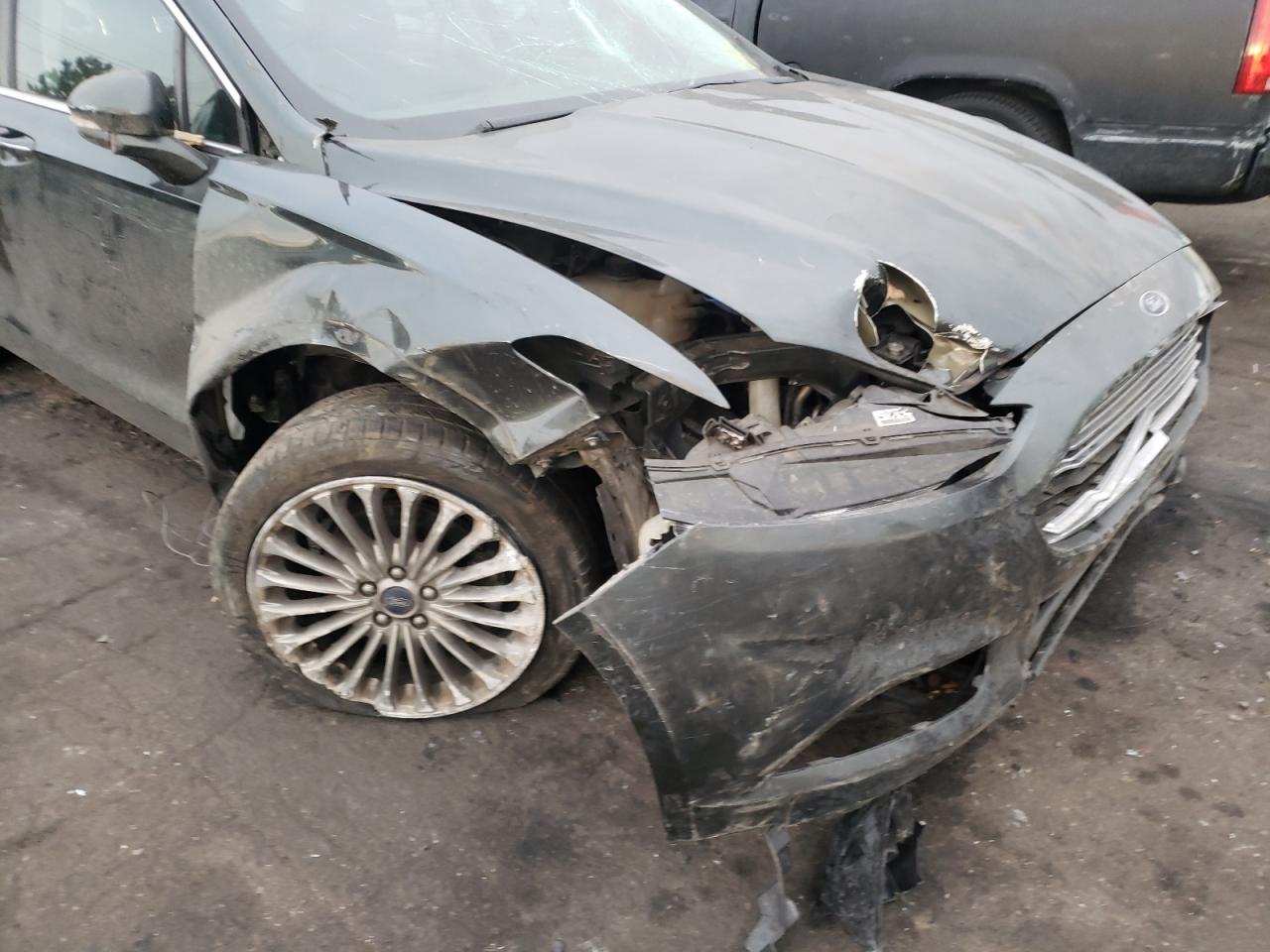 Photo 9 from auction – 2015 FORD FUSION TIT with VIN 3FA6P0K99FR161804
