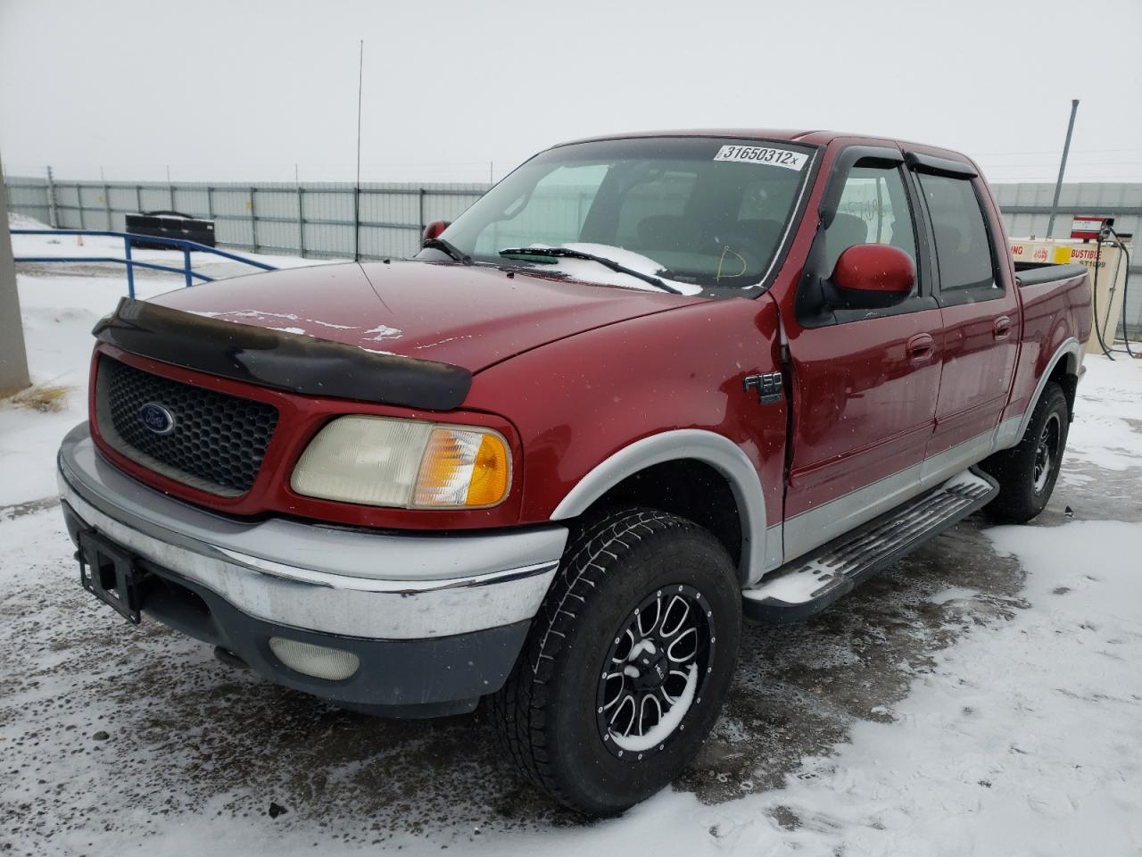 Photo 2 from auction – 2001 FORD F150 SUPER with VIN 1FTRW08LX1KF89116