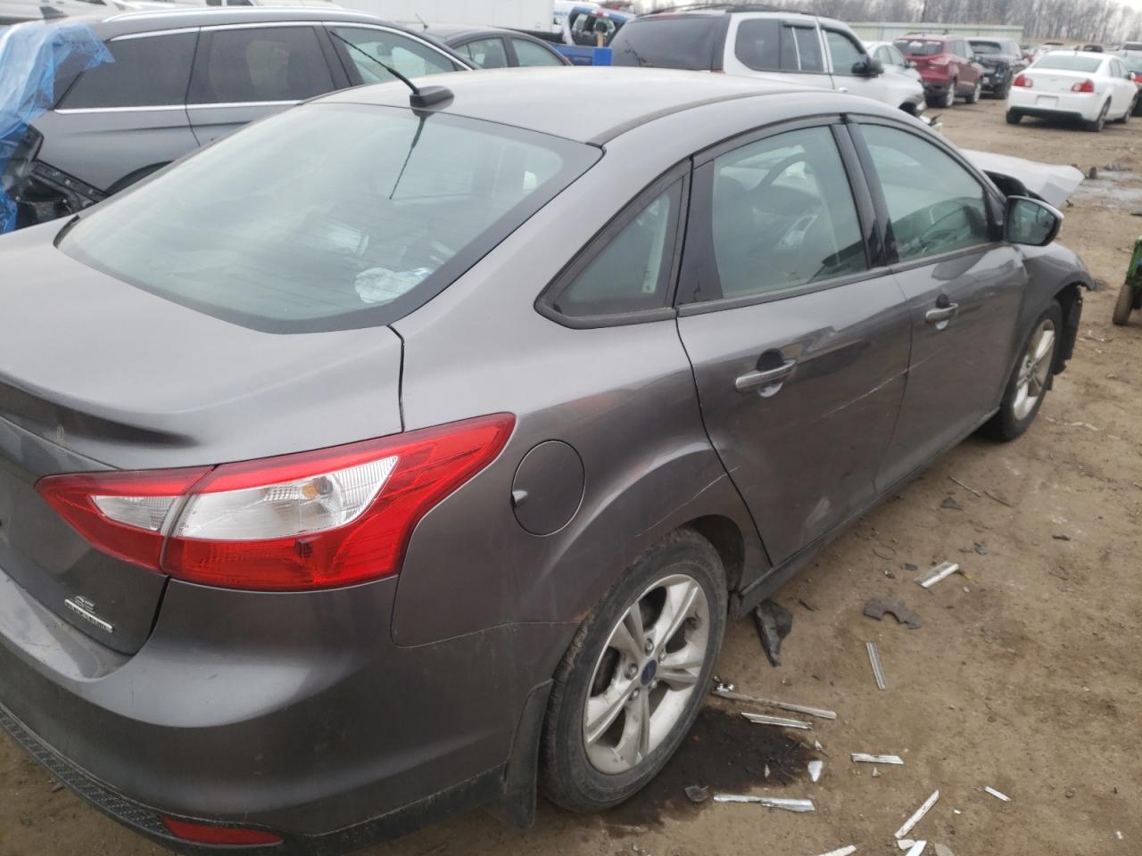 Foto 4 de la subasta – 2014 FORD FOCUS SE con VIN 1FADP3F23EL246110