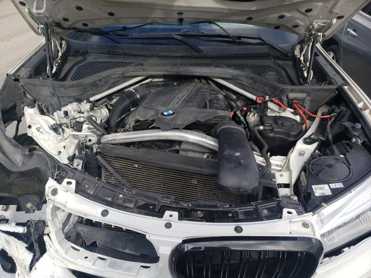 Photo 7 from auction – 2014 BMW X5 XDRIVE3 with VIN 5UXKR0C5XE0H17455