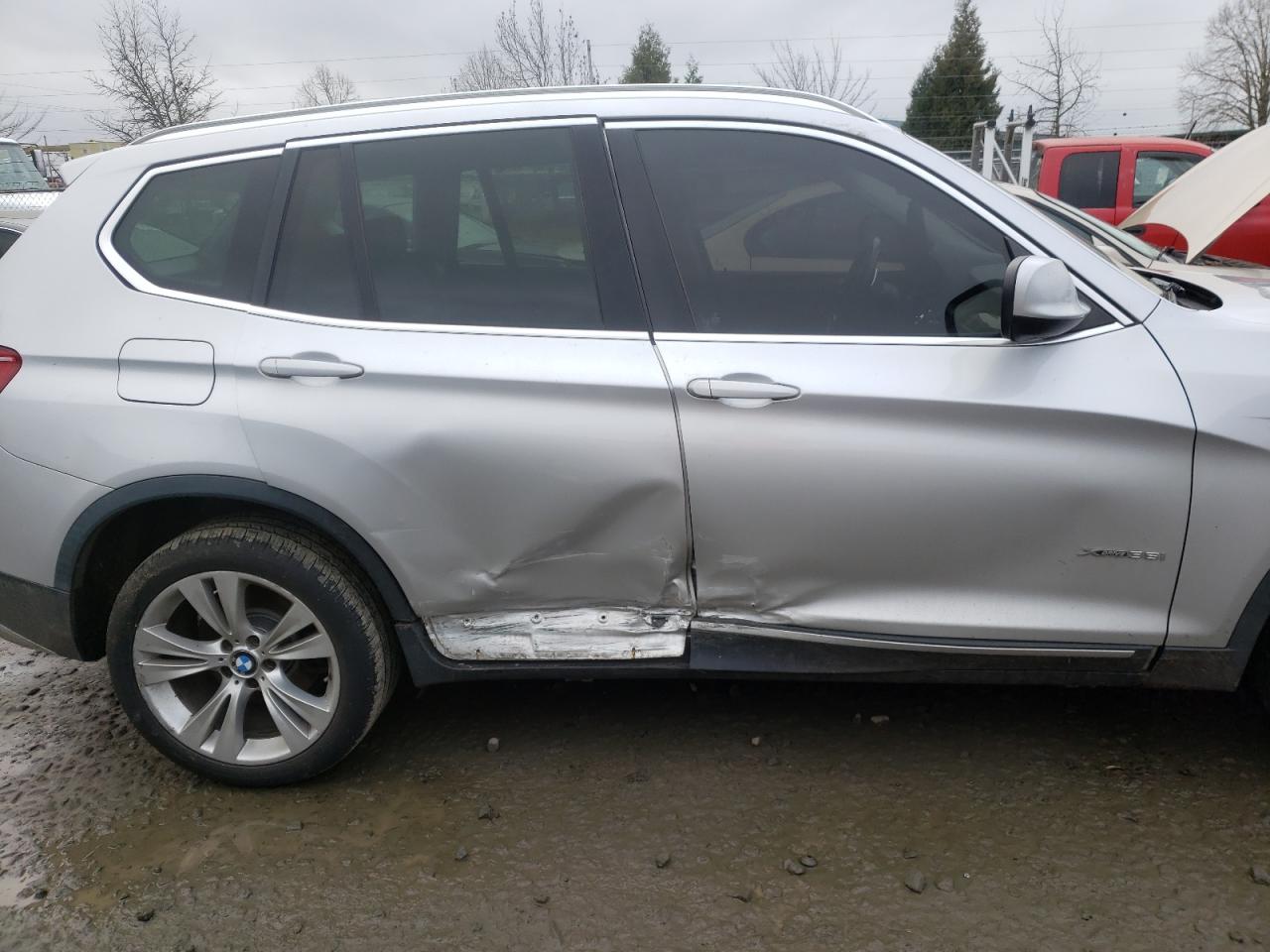 Photo 9 from auction – 2011 BMW X3 XDRIVE3 with VIN 5UXWX7C51BLT78088