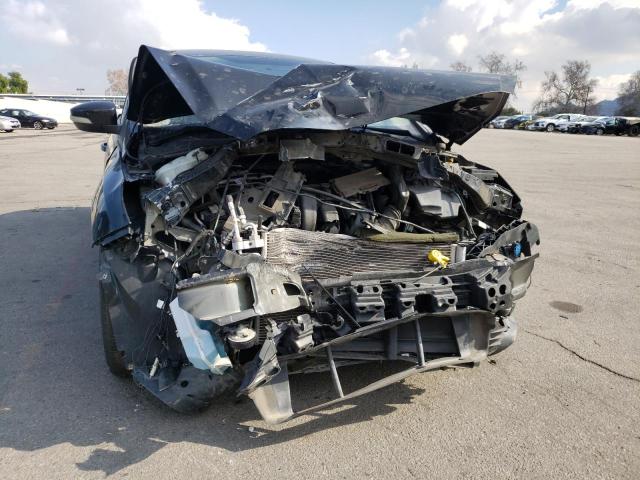Photo 9 from auction – 2015 FORD FOCUS SE with VIN 1FADP3F27FL275434