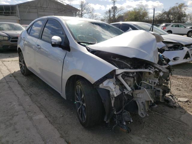 TOYOTA COROLLA L 2017 with VIN 5YFBURHE9HP698420 - Photo from auction