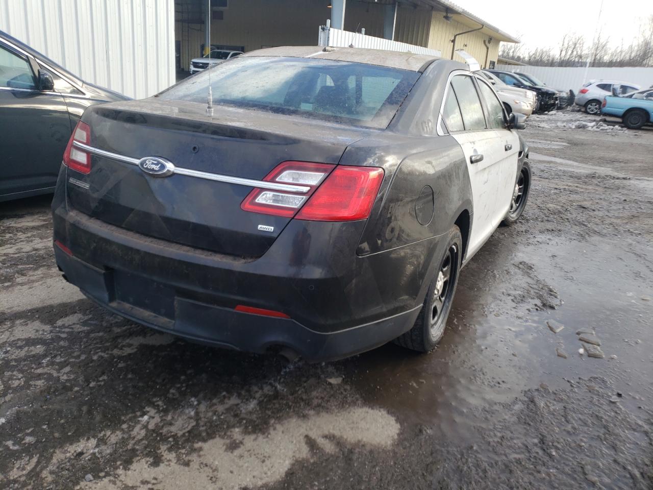 Photo 4 from auction – 2013 FORD TAURUS POL with VIN 1FAHP2M85DG213216