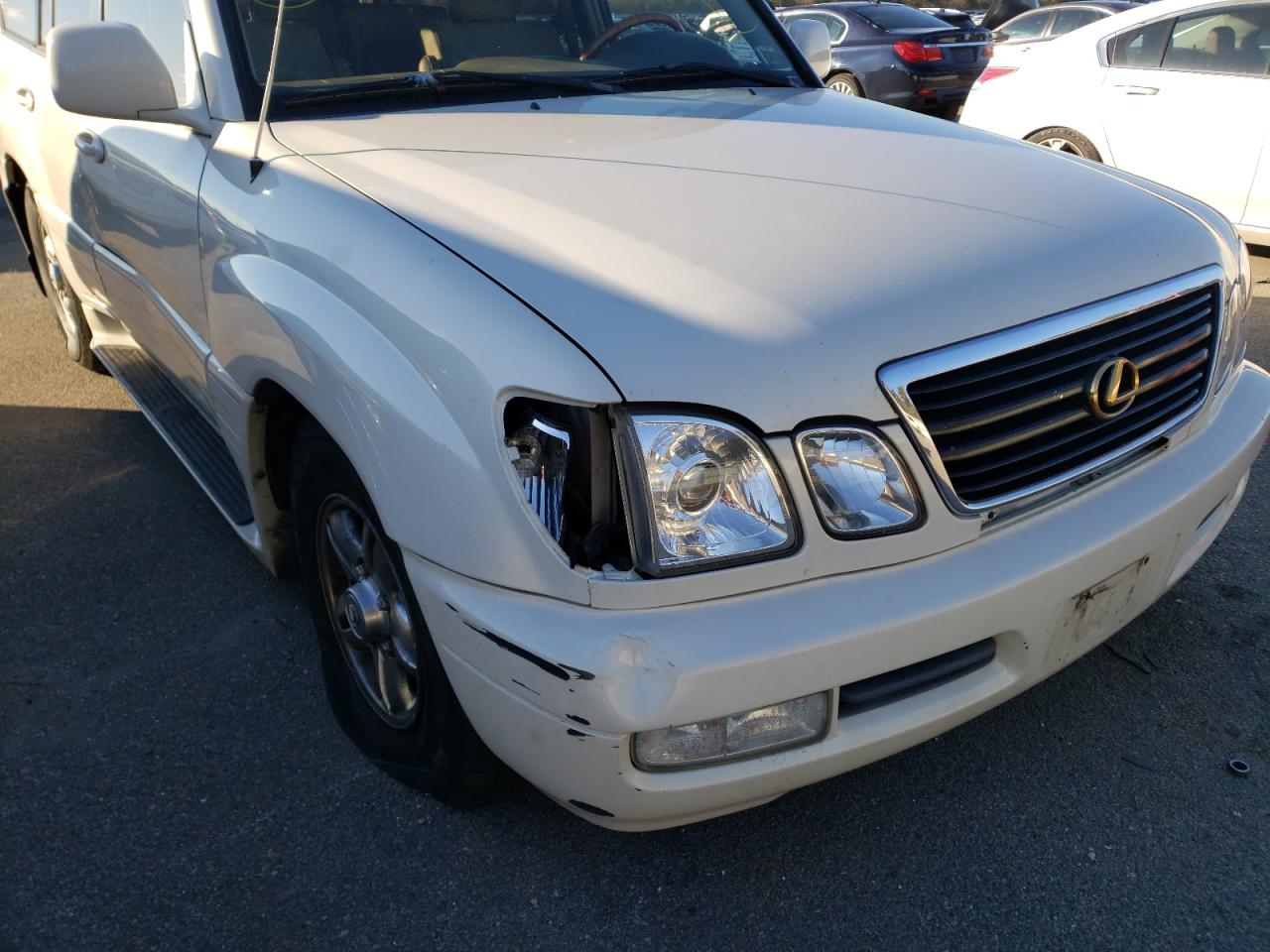 Photo 9 from auction – 2001 LEXUS LX 470 with VIN JTJHT00WX13504311