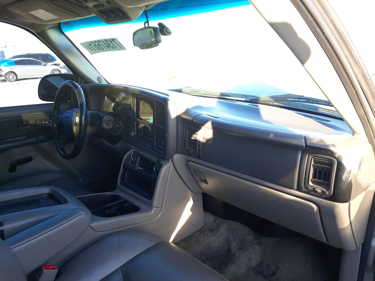 Photo 9 from auction – 2003 GMC YUKON with VIN 1GKEC13T93J284935