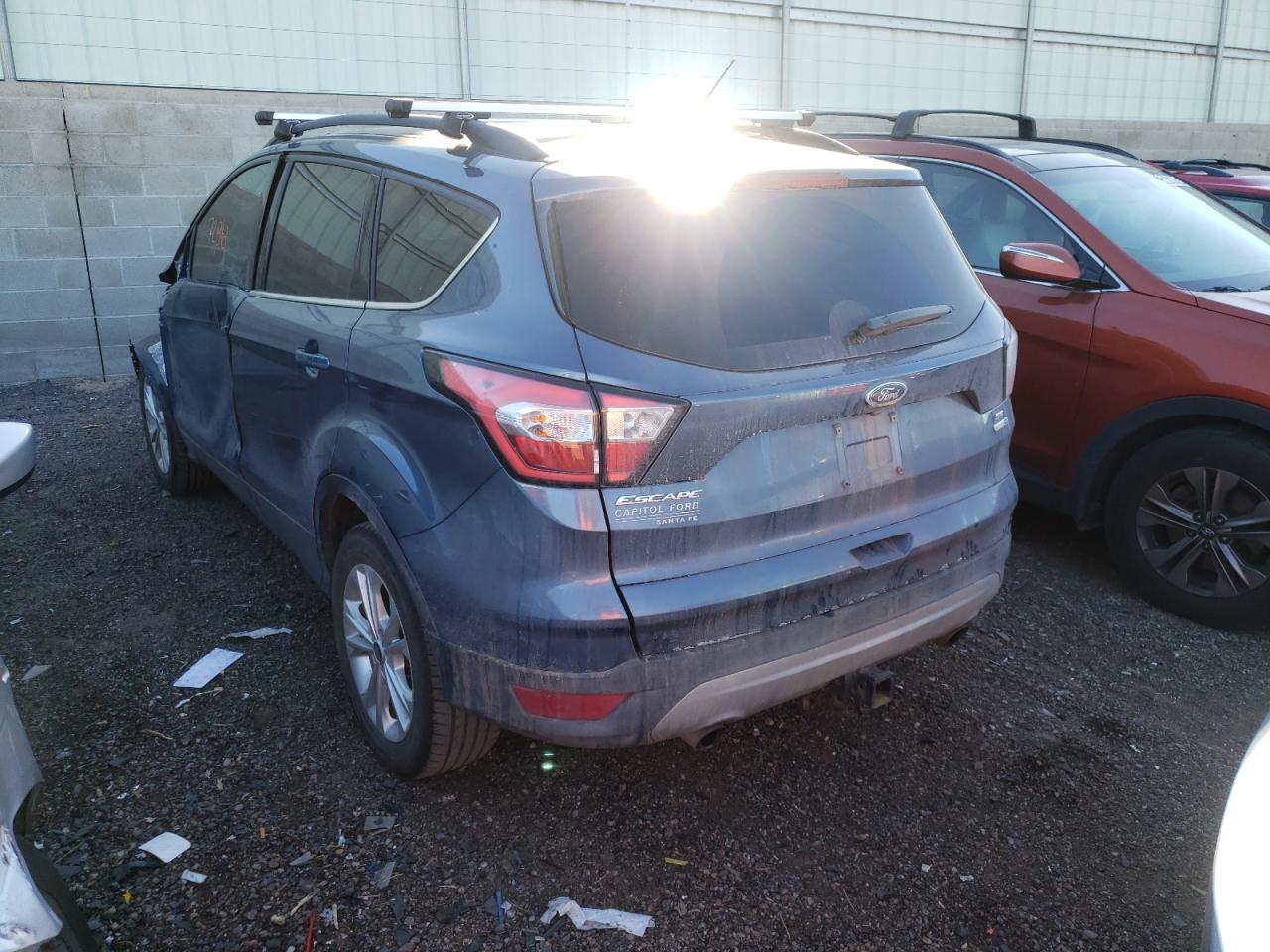Photo 3 from auction – 2018 FORD ESCAPE SE with VIN 1FMCU9GD7JUA85178
