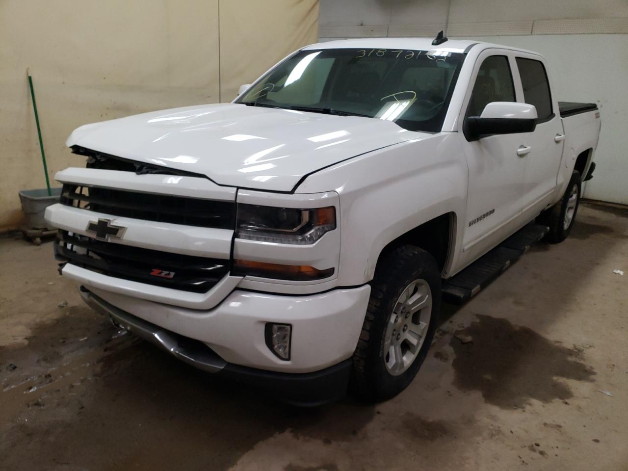 Photo 2 from auction – 2018 CHEVROLET SILVERADO with VIN 3GCUKREC7JG209896