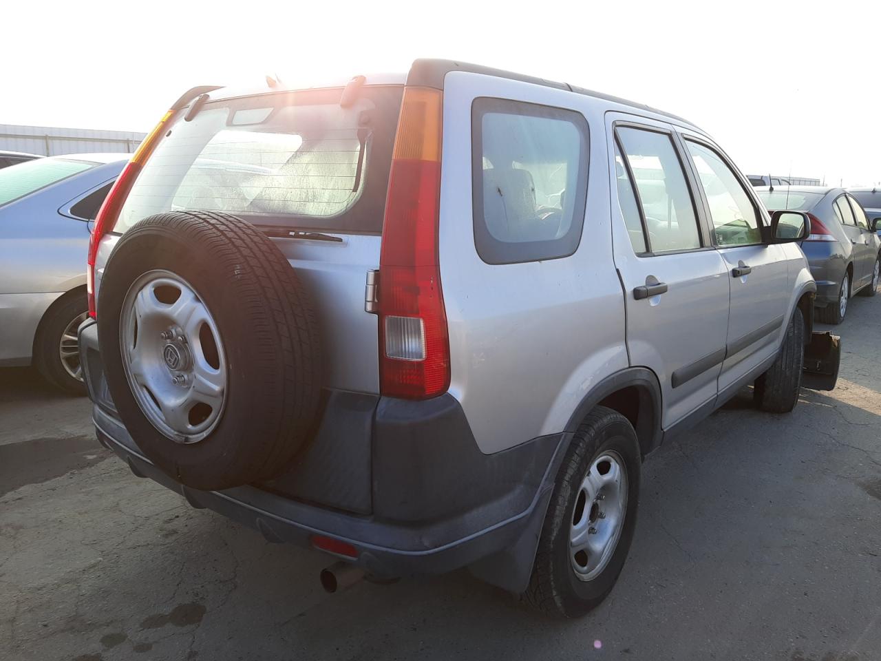 Photo 4 from auction – 2003 HONDA CR-V LX with VIN JHLRD68483C014613