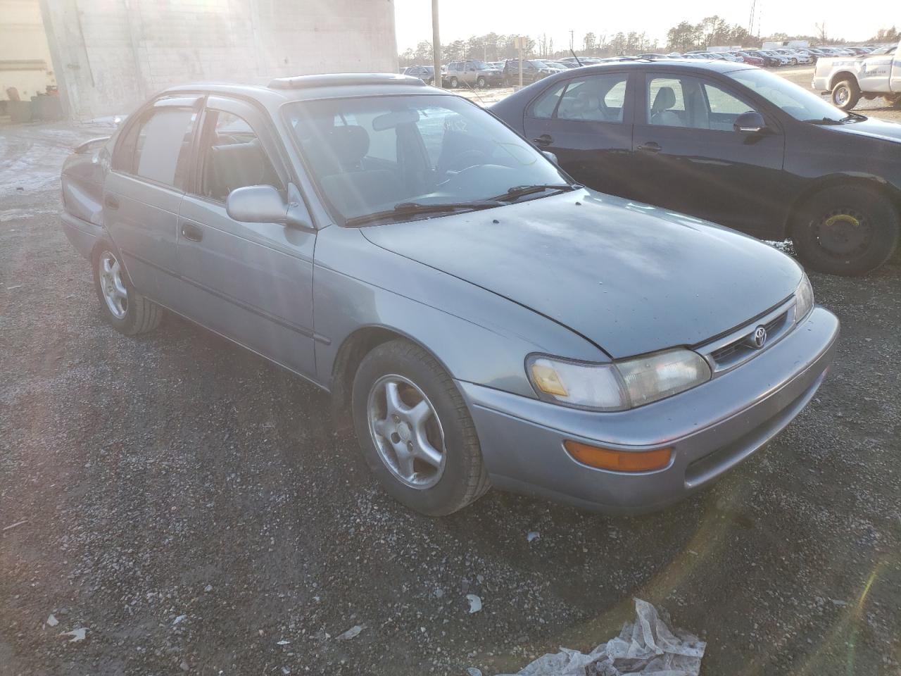 TOYOTA COROLLA DX 1997 with VIN 2T1BB02E8VC201346 - Photo from auction