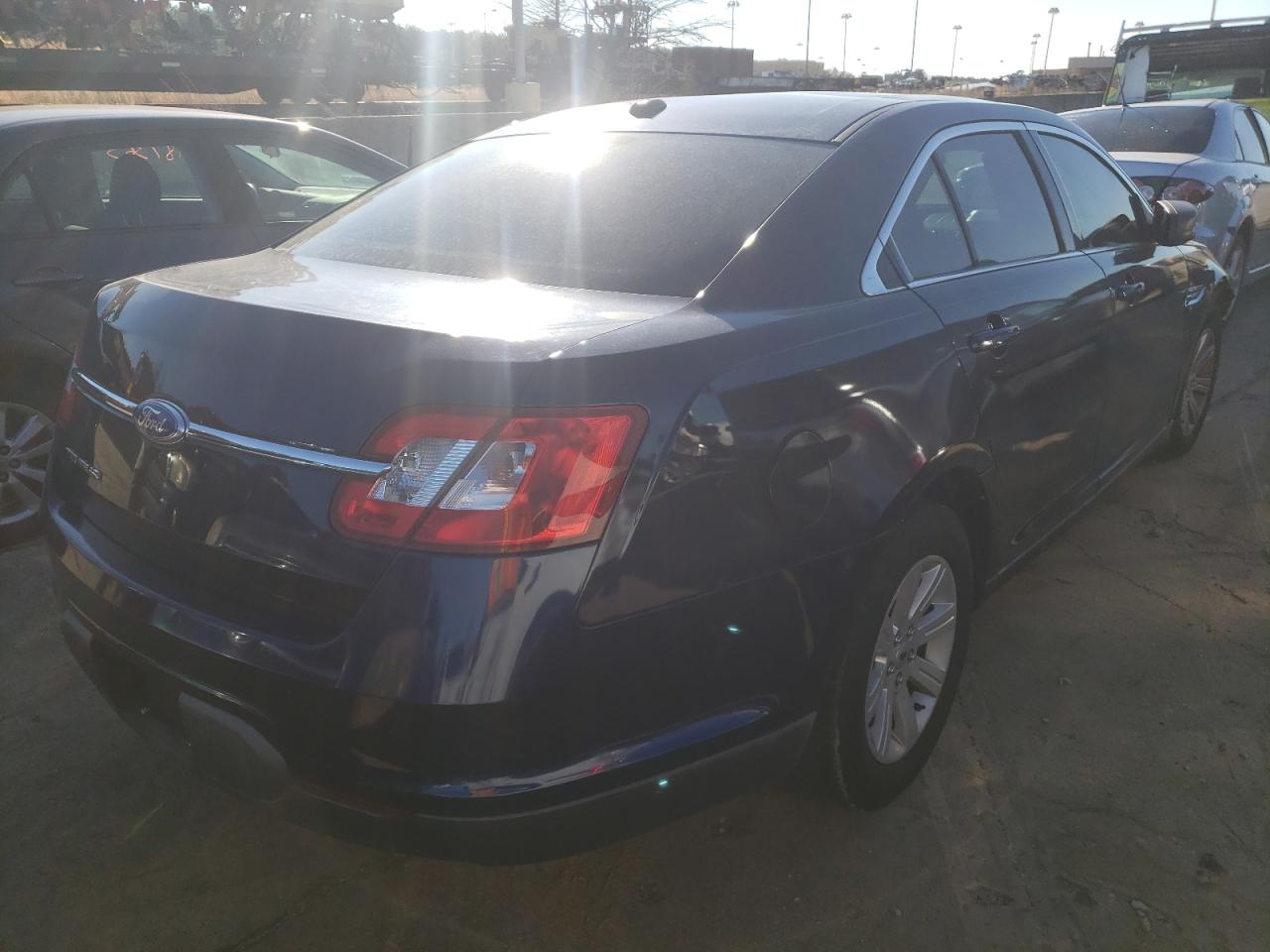 Photo 4 from auction – 2011 FORD TAURUS SE with VIN 1FAHP2DW9BG170186