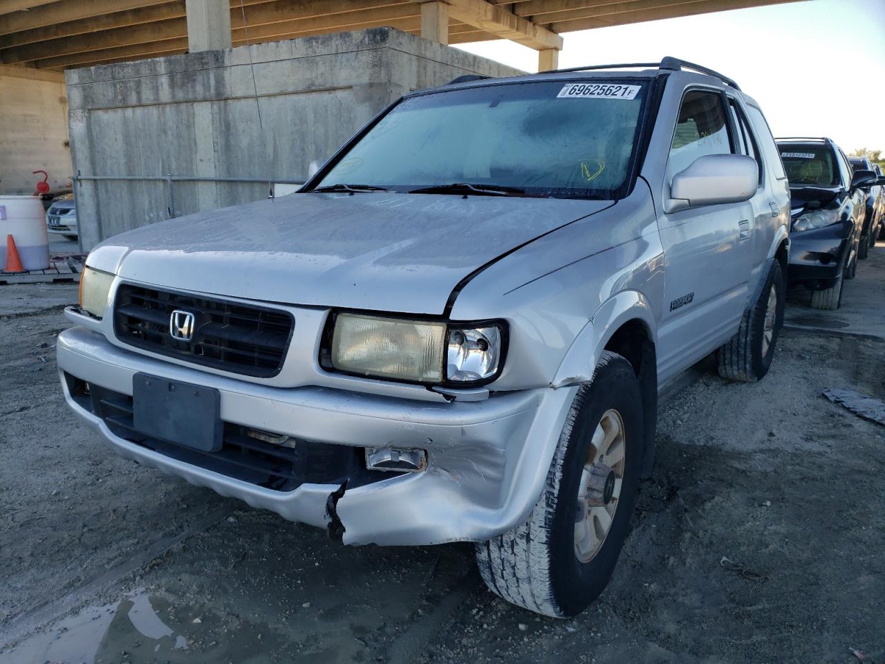 Photo 2 from auction – 1999 HONDA PASSPORT E with VIN 4S6CM58W7X4418651