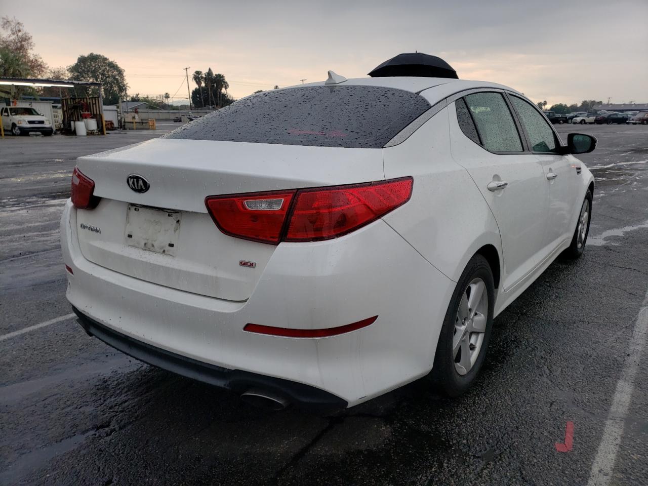 Photo 4 from auction – 2015 KIA OPTIMA LX with VIN KNAGM4A72F5664931