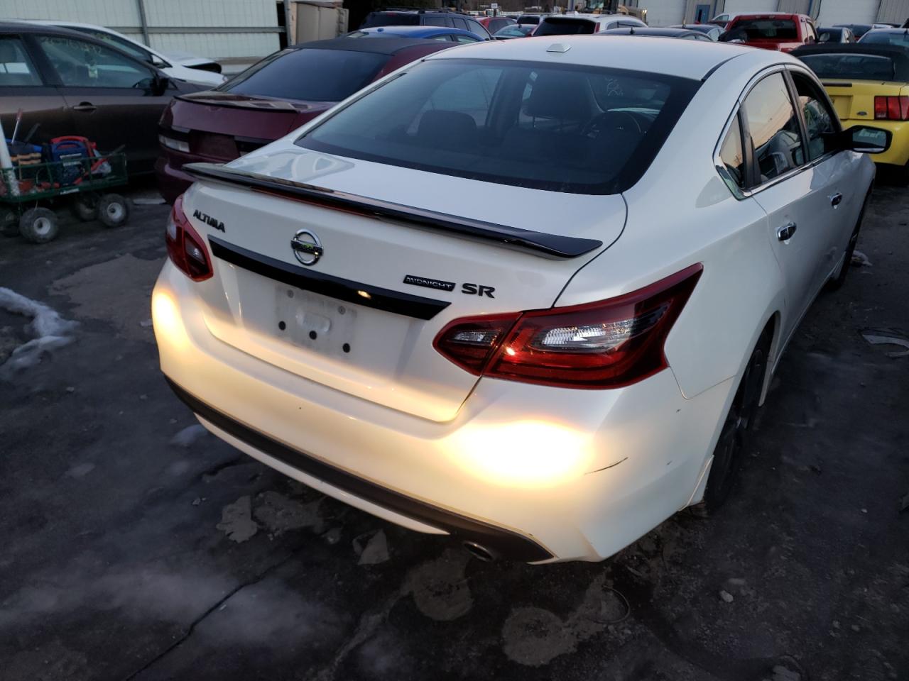 Photo 4 from auction – 2018 NISSAN ALTIMA 2.5 with VIN 1N4AL3AP1JC180992