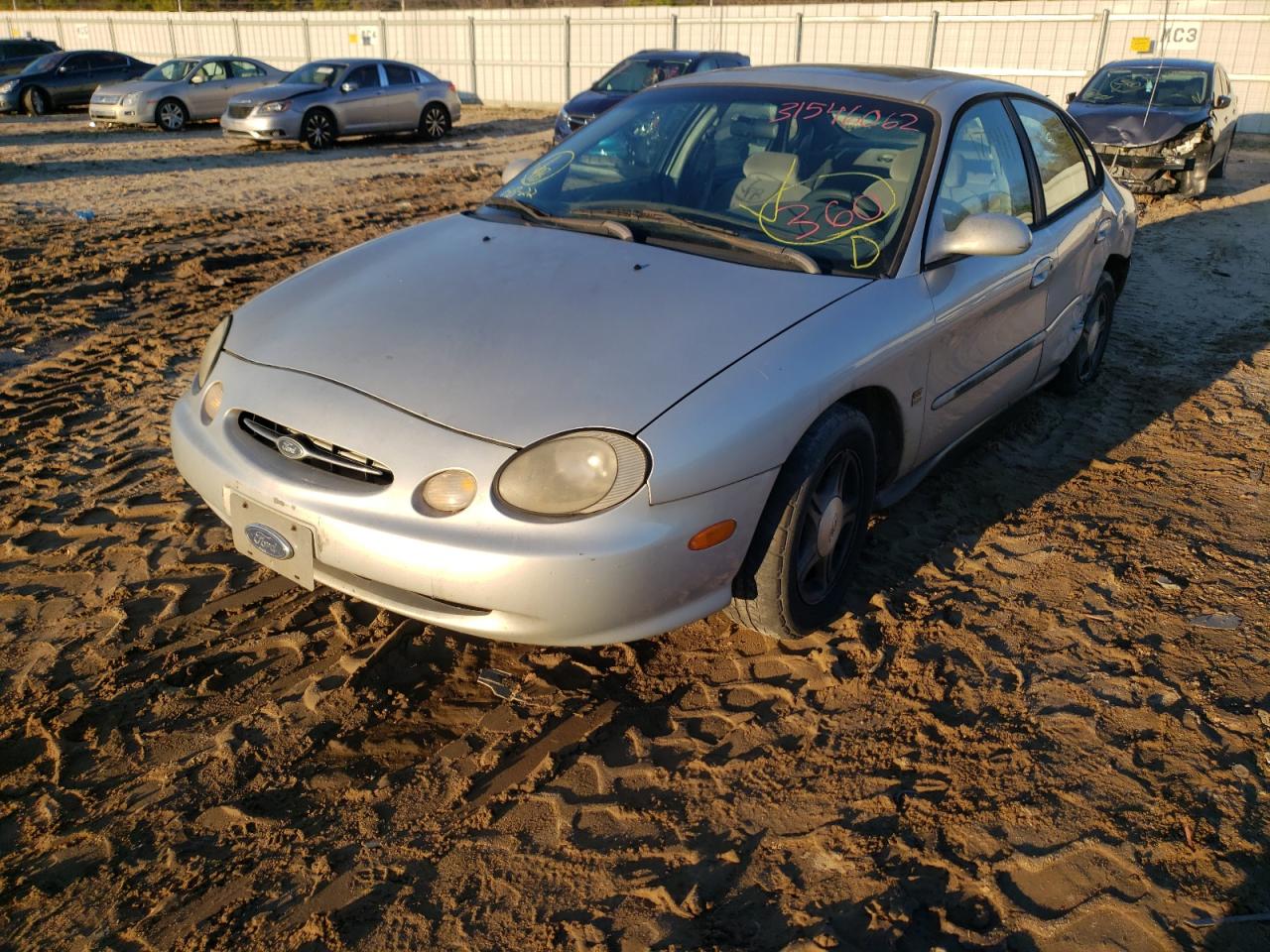 Photo 2 from auction – 1999 FORD TAURUS with VIN 1FAFP53S7XA216650
