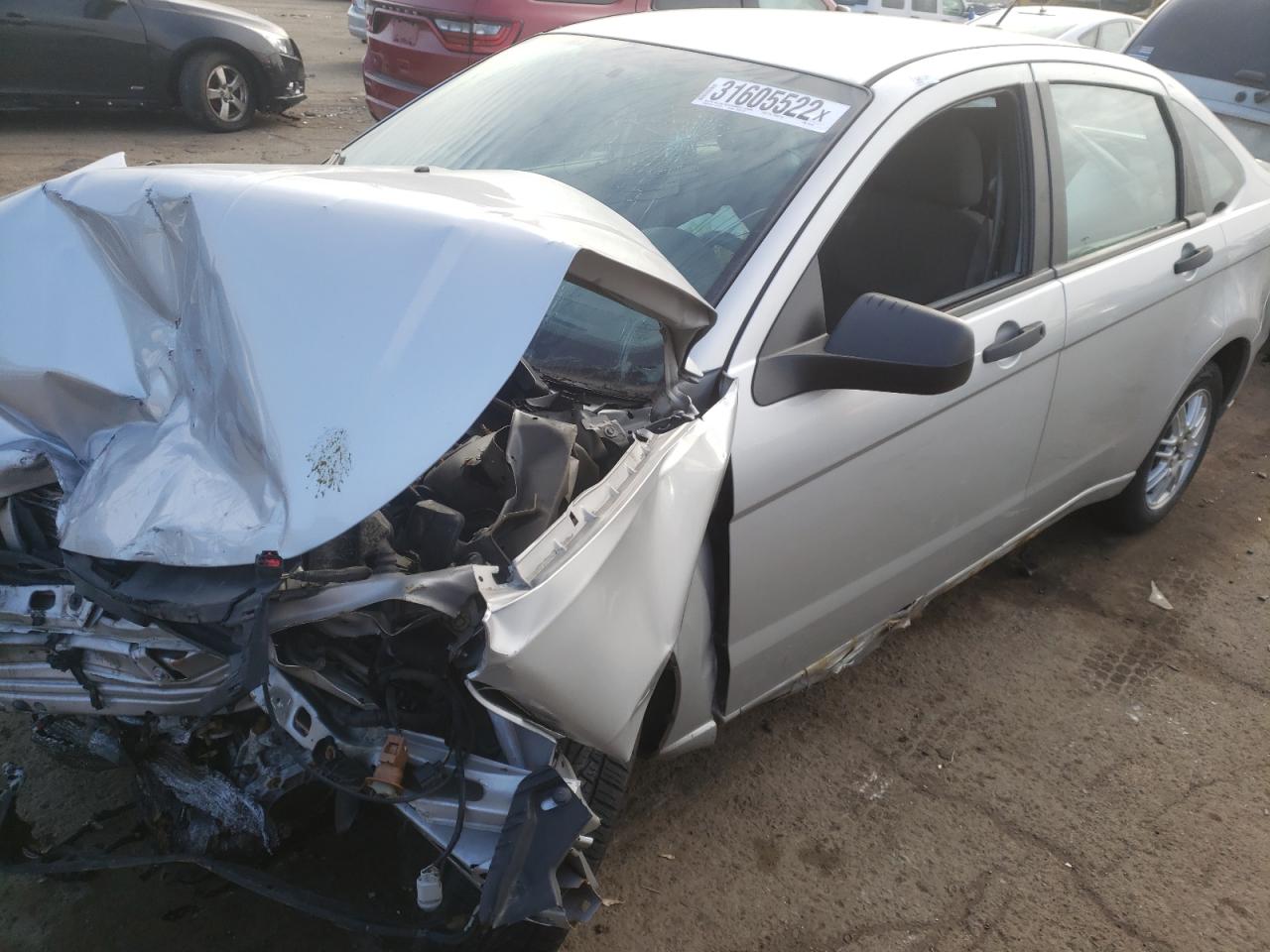 Photo 2 from auction – 2011 FORD FOCUS SE with VIN 1FAHP3FNXBW201767