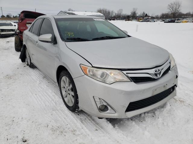 TOYOTA CAMRY 2014 with VIN 4T4BF1FKXER410702 - Photo from auction