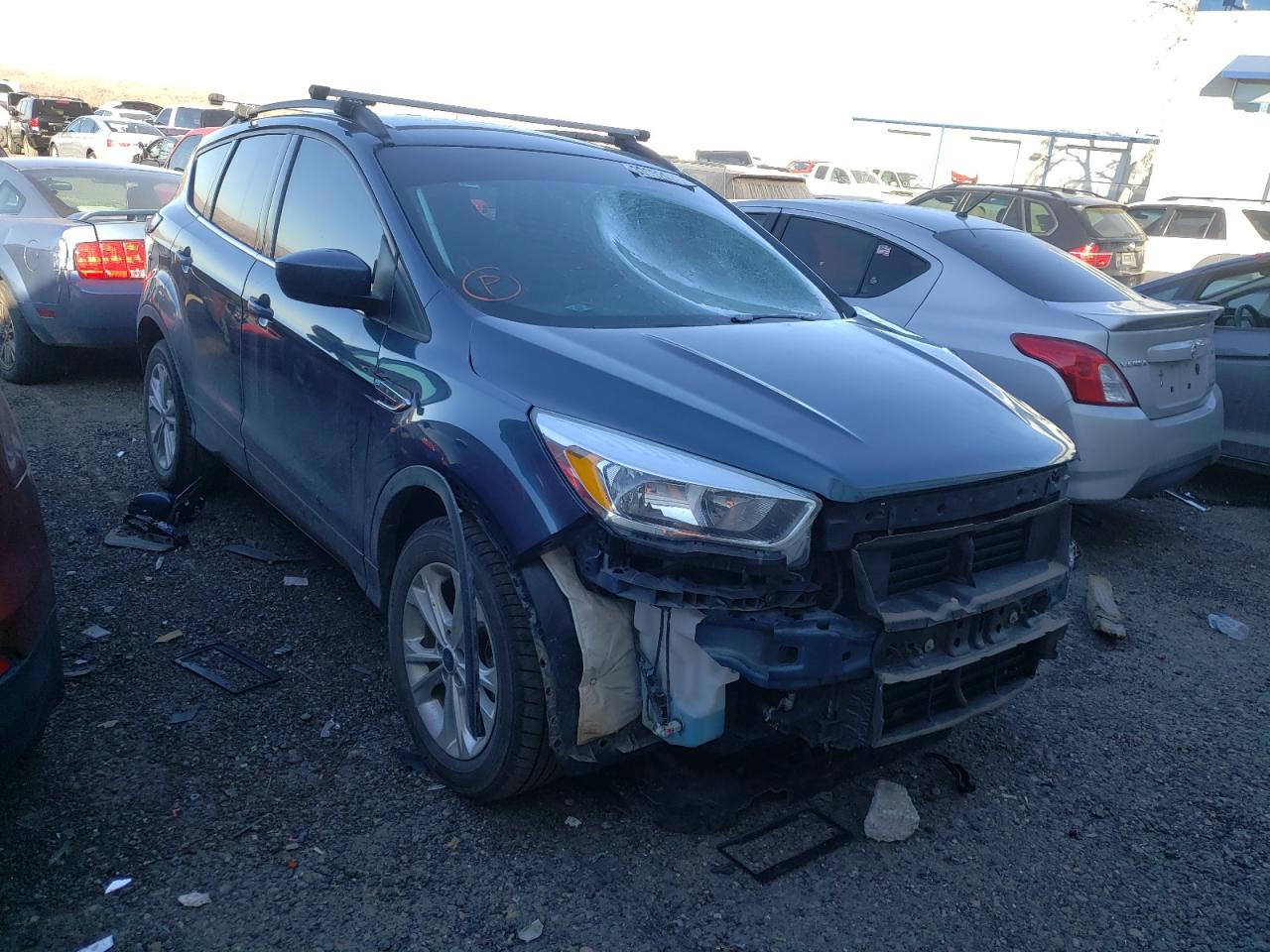FORD ESCAPE SE 2018 with VIN 1FMCU9GD7JUA85178 - Photo from auction